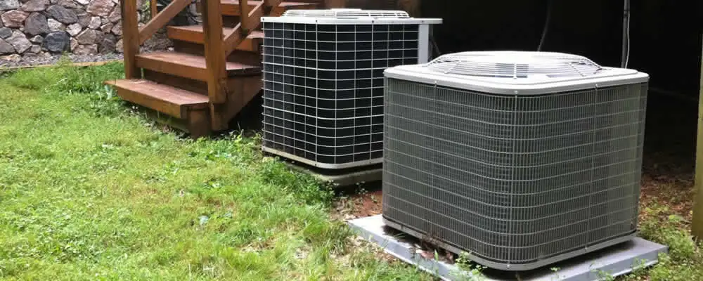 Heat pump installation and service units outside a home in Concord, MA